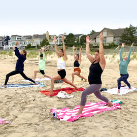 beach yoga with family and friends