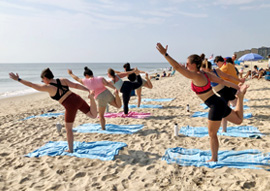 private group yoga class on the beach